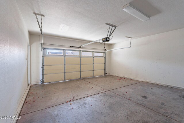 1244 S Tacoma, Mesa, AZ 85209 - garage with a garage door opener and baseboards