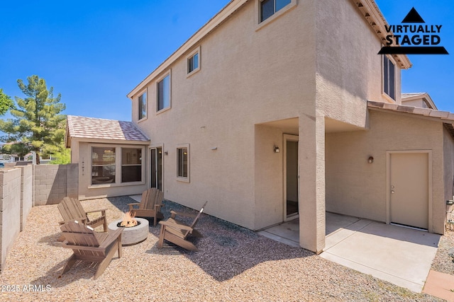 1244 S Tacoma, Mesa, AZ 85209 - back of property with stucco siding, a patio, fence, and an outdoor fire pit