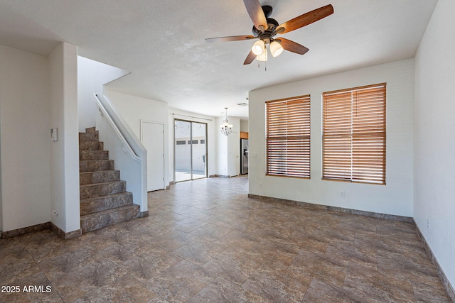 1244 S Tacoma, Mesa, AZ 85209 - unfurnished living room with baseboards, ceiling fan, stairs, and stone finish flooring