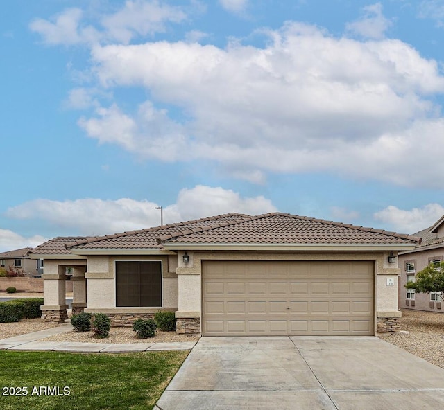 view of front of property with a garage