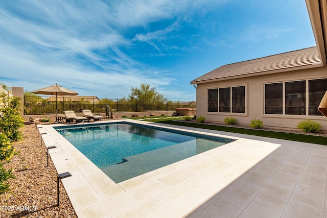 view of pool with a fenced backyard, a patio area, and a fenced in pool