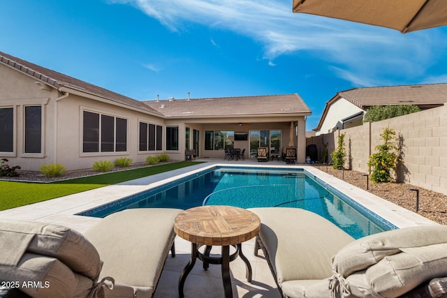 view of pool with an outdoor hangout area, a fenced in pool, a fenced backyard, and a patio area