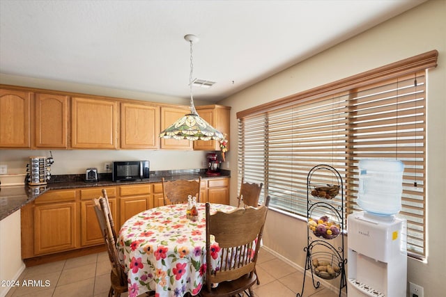 view of tiled dining space