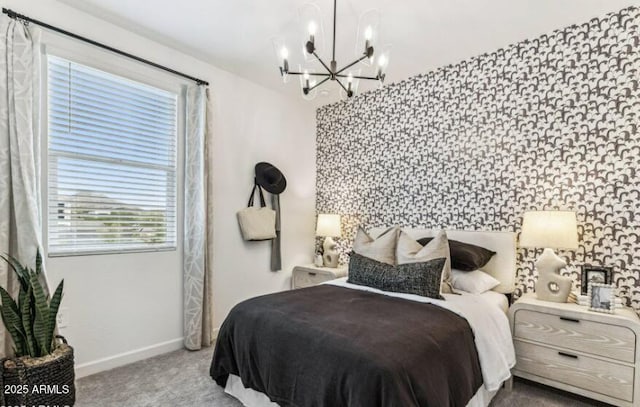 carpeted bedroom with a chandelier