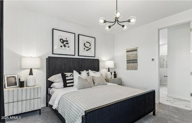 bedroom featuring an inviting chandelier