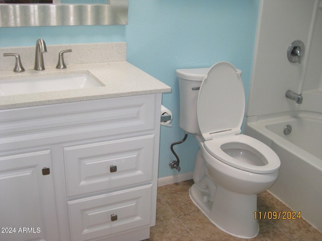 full bathroom featuring tile patterned floors, vanity, toilet, and tub / shower combination