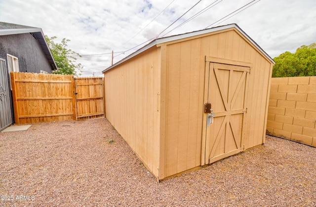 418 E 5th St, Eloy, AZ 85131 - view of shed with a fenced backyard