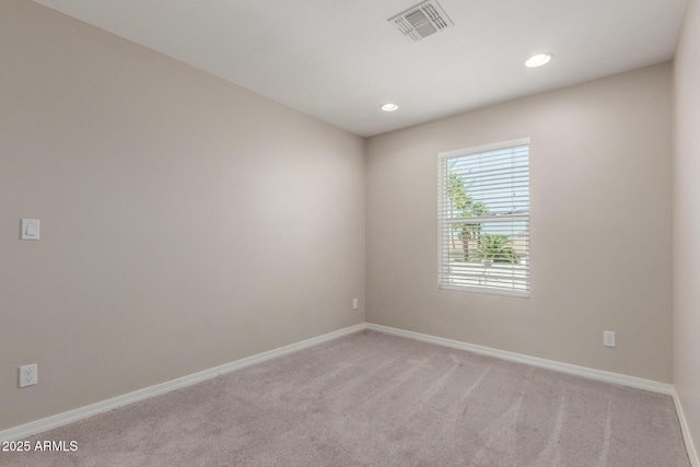 2000 N 36th St Unit 14, Phoenix, AZ 85008 - empty room featuring light colored carpet and recessed lighting
