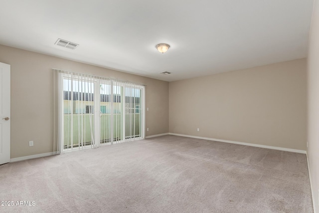 2000 N 36th St Unit 14, Phoenix, AZ 85008 - unfurnished room with carpet flooring and baseboards