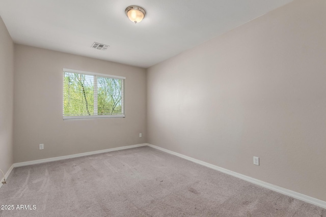 2000 N 36th St Unit 14, Phoenix, AZ 85008 - carpeted empty room featuring baseboards