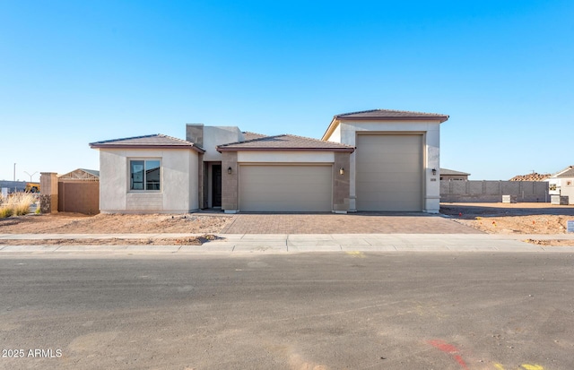 view of front of property featuring a garage