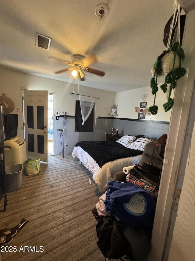 418 N 14th St, Phoenix, AZ 85006 - carpeted bedroom featuring a textured ceiling and ceiling fan