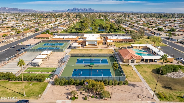 birds eye view of property with a mountain view