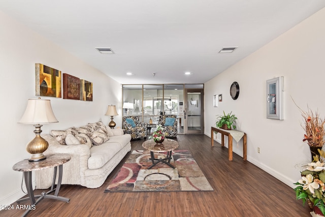 living room featuring dark hardwood / wood-style flooring