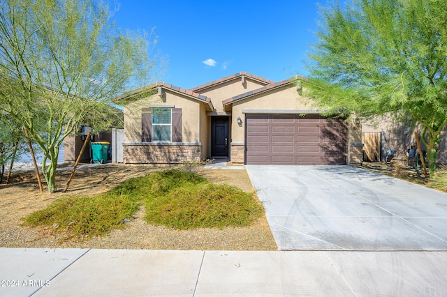 single story home with a garage