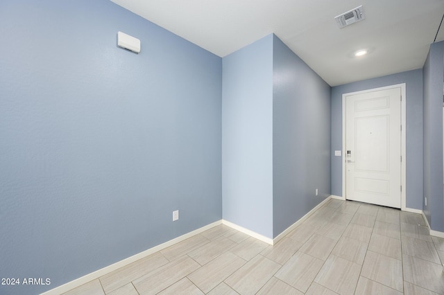 12568 W Orangewood Ave, Glendale, AZ 85307 - spare room with baseboards and visible vents