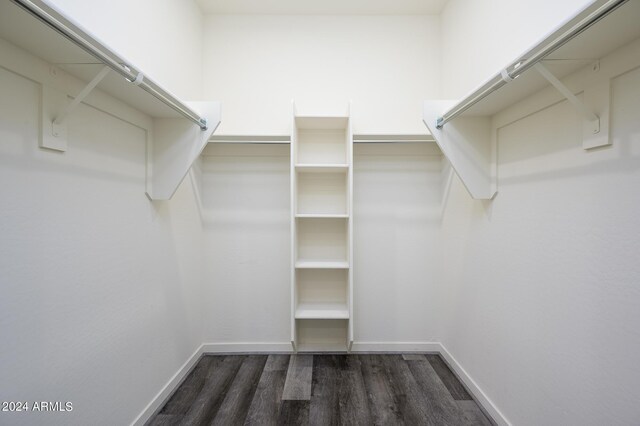 12568 W Orangewood Ave, Glendale, AZ 85307 - walk in closet featuring wood finished floors