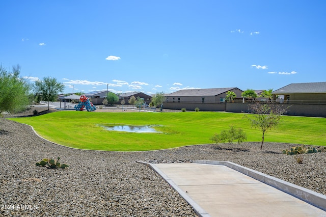 view of yard with a water view