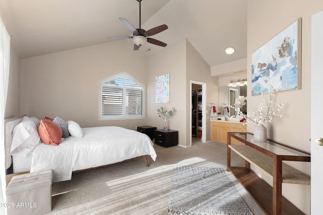 4435 E Savannah Cir, Flagstaff, AZ 86004 - bedroom featuring light carpet, lofted ceiling, a ceiling fan, a closet, and a walk in closet