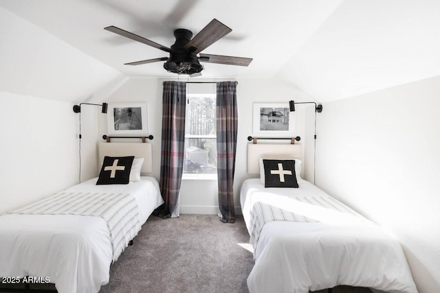 carpeted bedroom featuring ceiling fan and vaulted ceiling