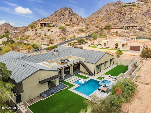 aerial view featuring a mountain view