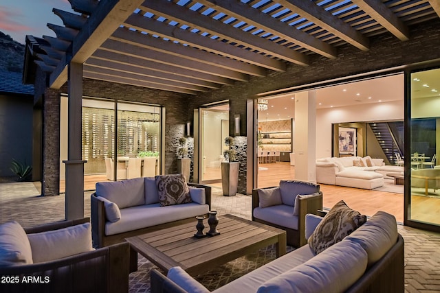 view of patio / terrace featuring a pergola and an outdoor hangout area