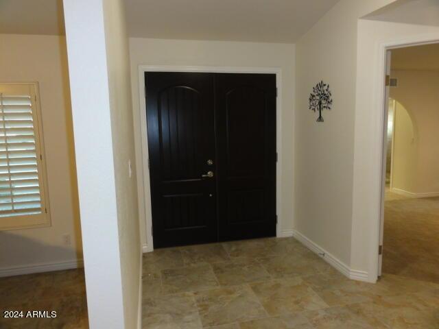 foyer with baseboards