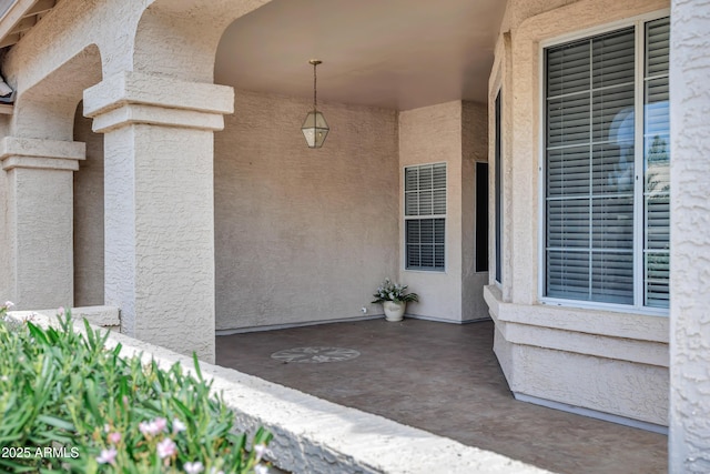6368 W Firebird Dr, Glendale, AZ 85308 - doorway to property featuring stucco siding and a patio