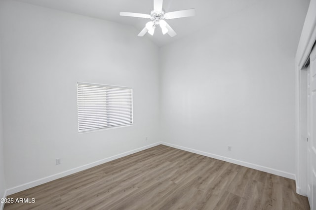 6368 W Firebird Dr, Glendale, AZ 85308 - unfurnished room featuring light wood finished floors, baseboards, vaulted ceiling, and a ceiling fan