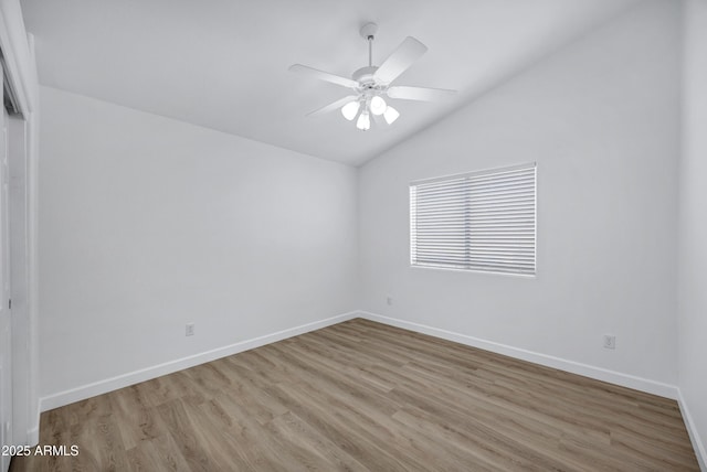 6368 W Firebird Dr, Glendale, AZ 85308 - unfurnished room featuring lofted ceiling, light wood finished floors, a ceiling fan, and baseboards