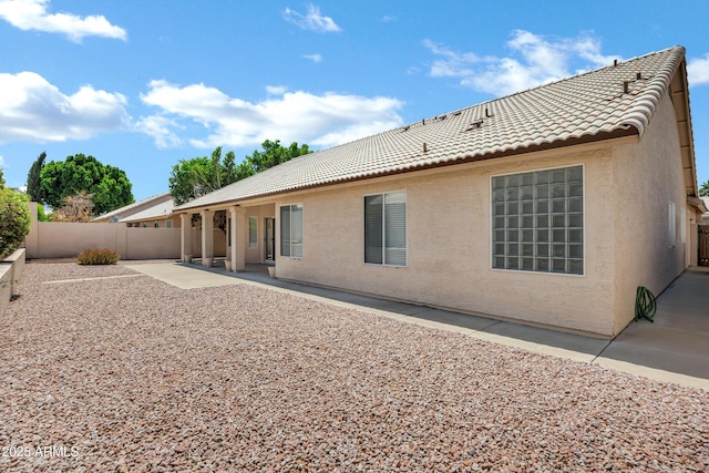 6368 W Firebird Dr, Glendale, AZ 85308 - rear view of house with a tile roof, stucco siding, a fenced backyard, and a patio area