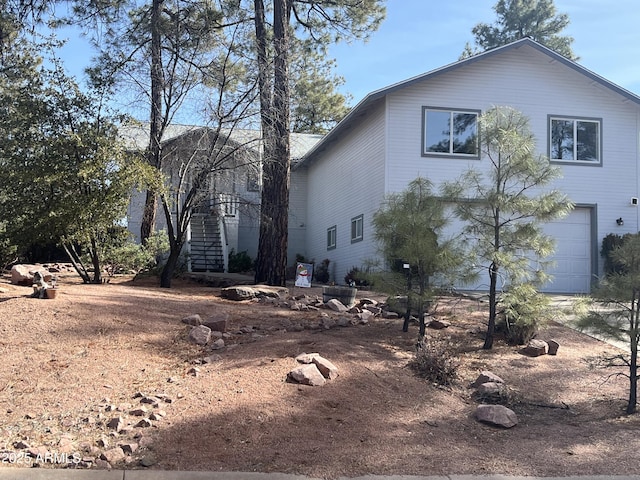 view of home's exterior featuring a garage