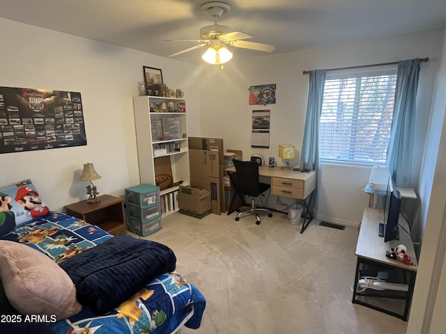 carpeted bedroom featuring ceiling fan