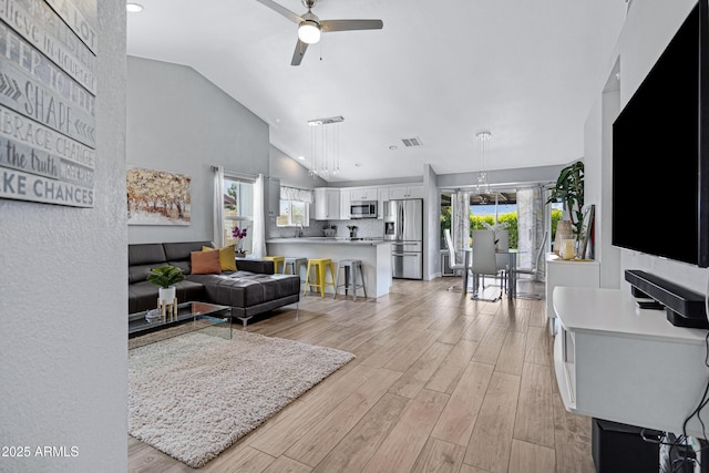 20822 N 34th Dr, Phoenix, AZ 85027 - living area with a ceiling fan, light wood-type flooring, recessed lighting, and high vaulted ceiling