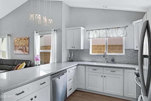 20822 N 34th Dr, Phoenix, AZ 85027 - kitchen with stainless steel appliances, white cabinets, decorative backsplash, dark wood-style floors, and a sink