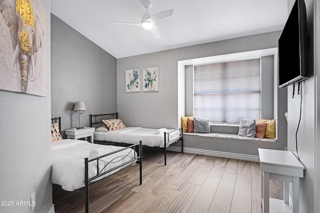 20822 N 34th Dr, Phoenix, AZ 85027 - bedroom featuring wood finished floors, lofted ceiling, and a ceiling fan