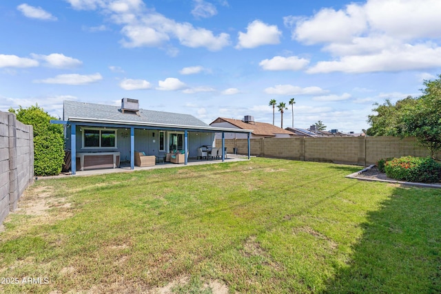 20822 N 34th Dr, Phoenix, AZ 85027 - rear view of property featuring a patio and an outdoor hangout area