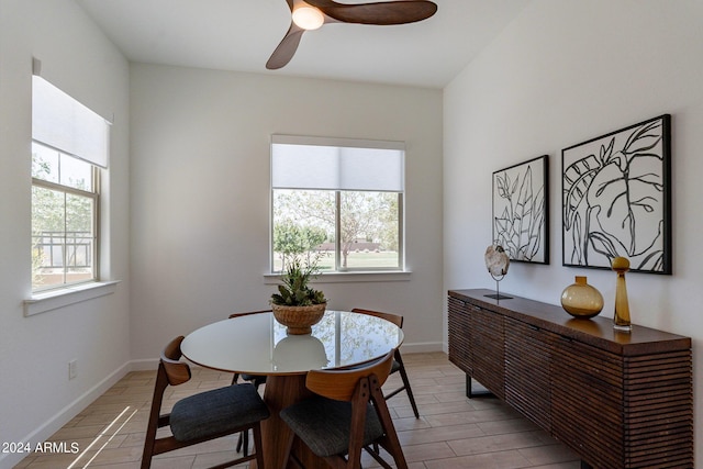 dining area featuring ceiling fan and a healthy amount of sunlight