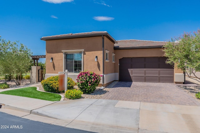 view of front of property featuring a garage