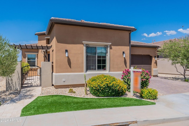 view of front of home with a garage