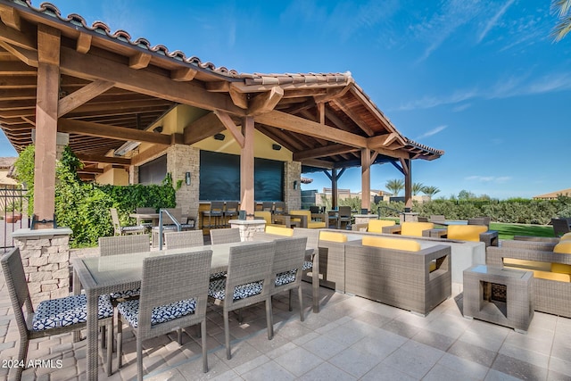 view of patio with a gazebo and an outdoor hangout area