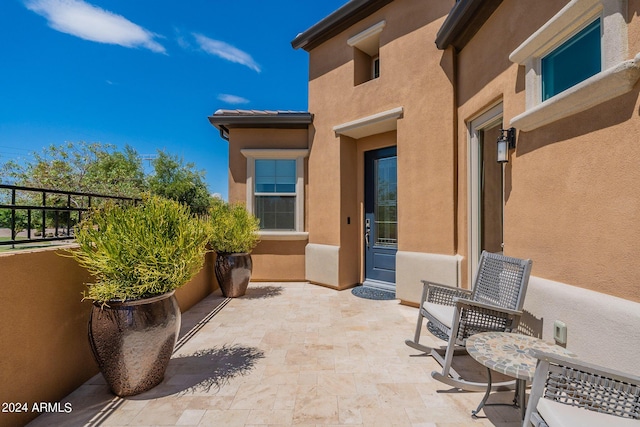 view of patio / terrace with a balcony