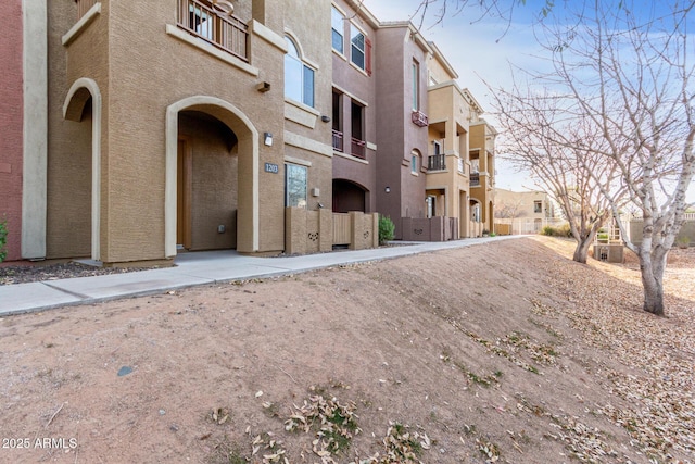 view of building exterior with a residential view