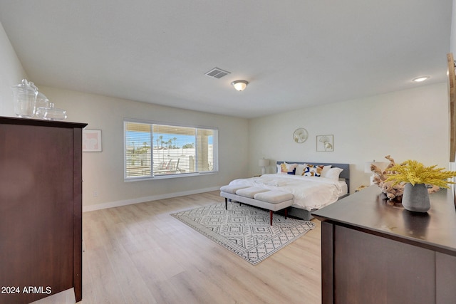 bedroom featuring light hardwood / wood-style floors