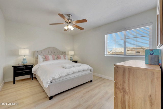 bedroom featuring ceiling fan and light wood-type flooring