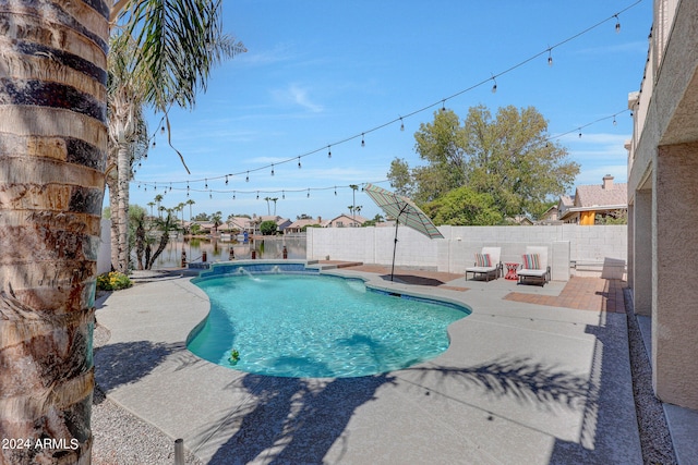 view of swimming pool featuring a patio and pool water feature