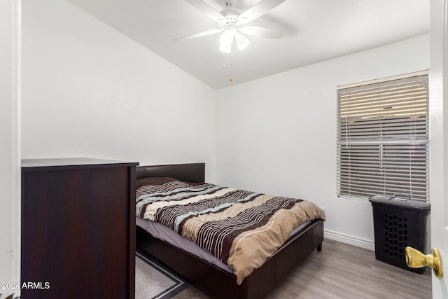 bedroom featuring light hardwood / wood-style flooring and ceiling fan