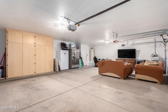 garage featuring white refrigerator, electric water heater, stainless steel refrigerator with ice dispenser, and a garage door opener