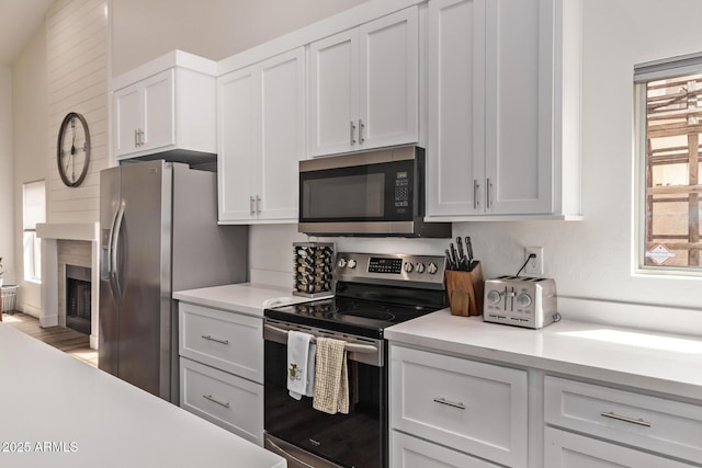 1777 W Redfield Rd, Gilbert, AZ 85233 - kitchen featuring light countertops, white cabinetry, and stainless steel appliances