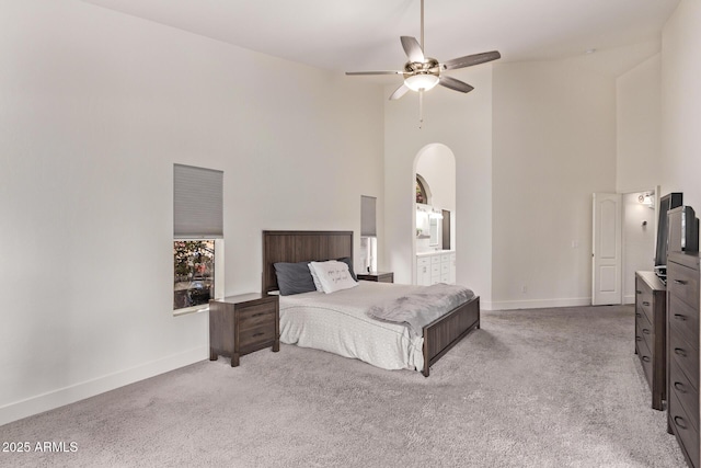 1777 W Redfield Rd, Gilbert, AZ 85233 - bedroom featuring light carpet, baseboards, and a towering ceiling